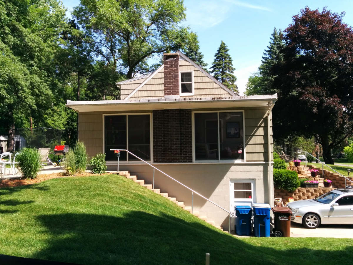 Home with addition above garage