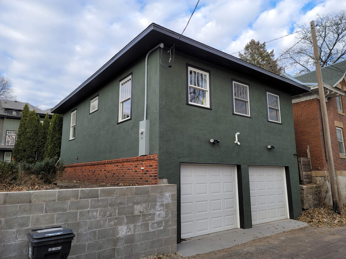 Garage with 2nd level living space. 2 stall and door garage